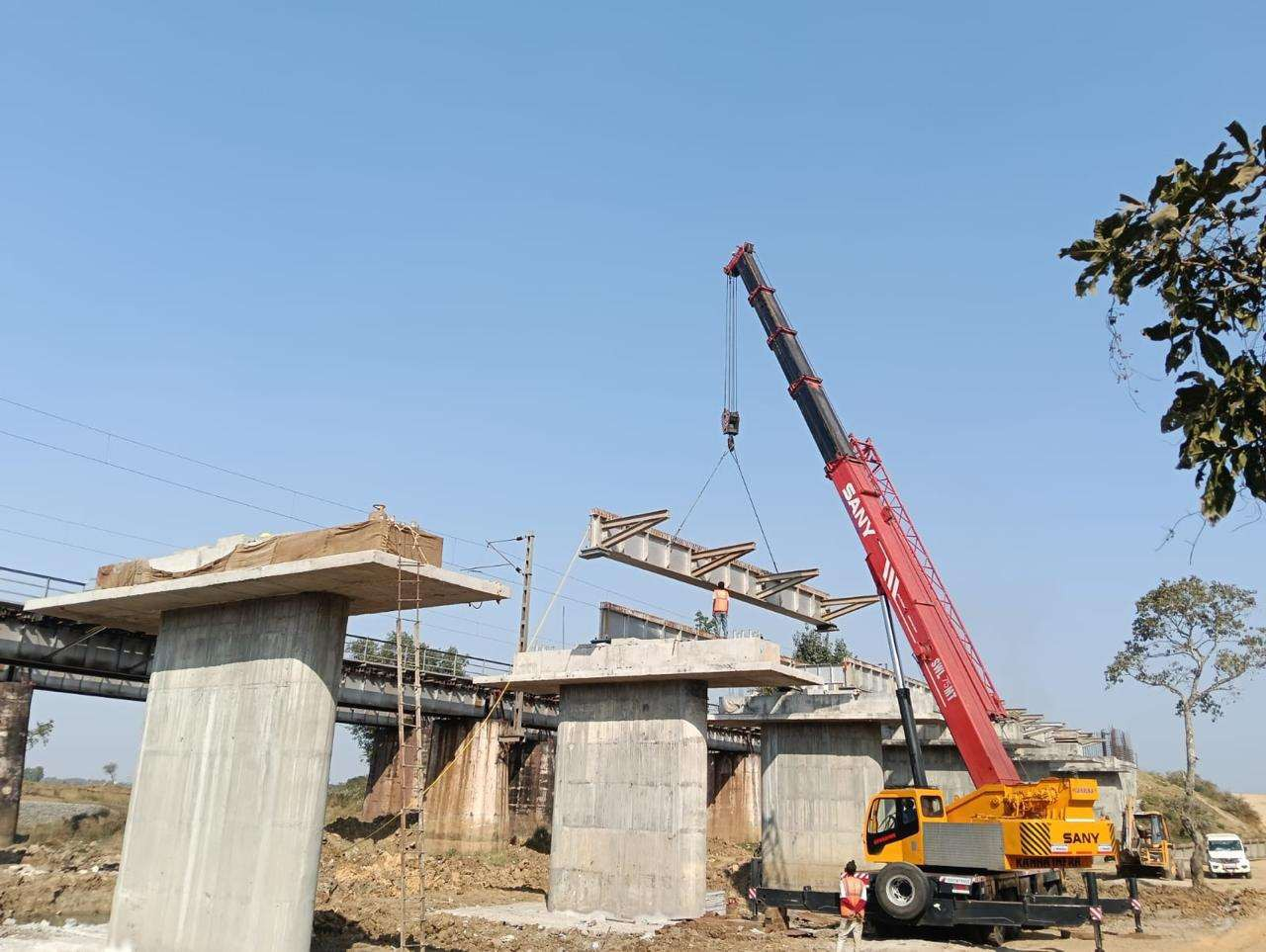 Crane-assisted bridge erection